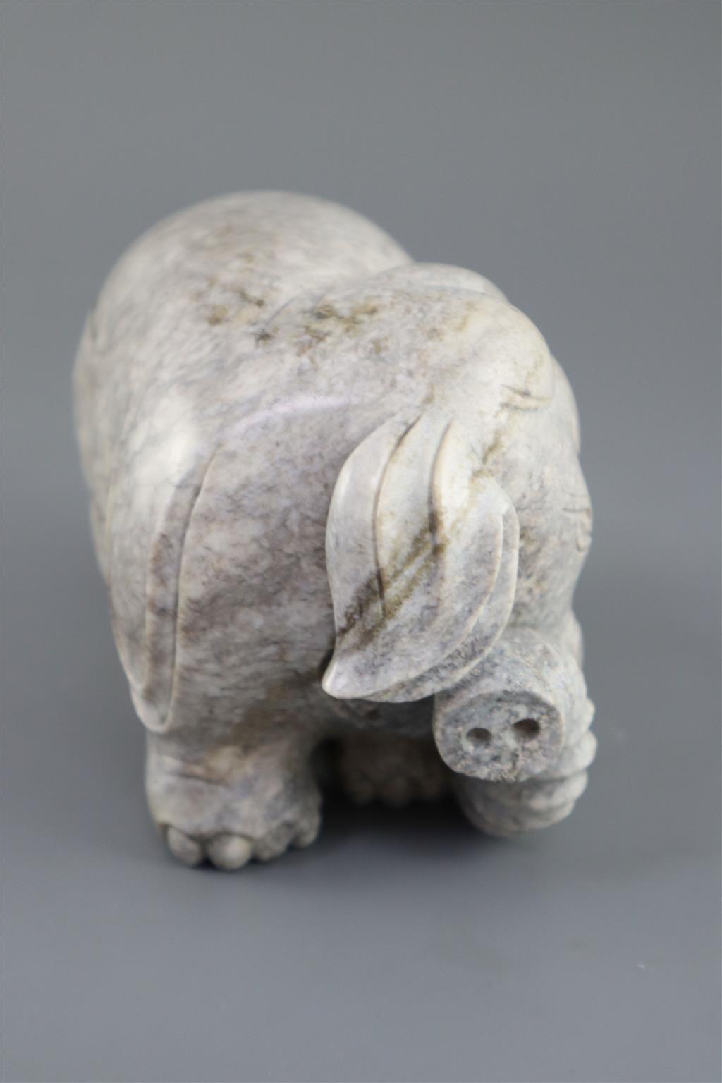 A Chinese burnt jade figure of an elephant, 15.5cm long